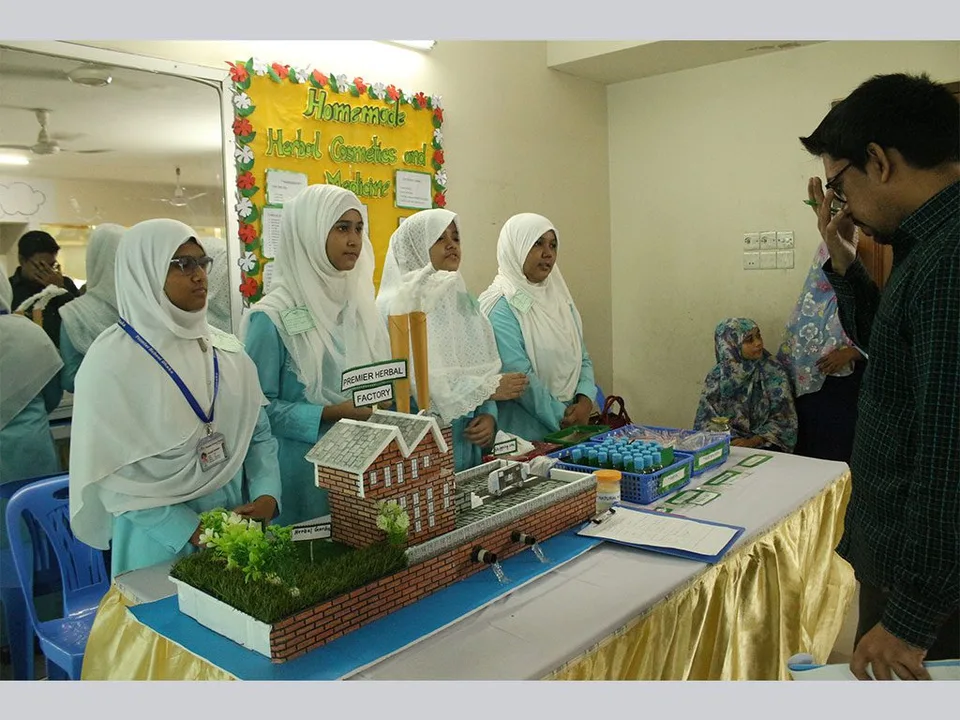 Students displaying projects at Premier School Dhaka’s 2019 science exhibition