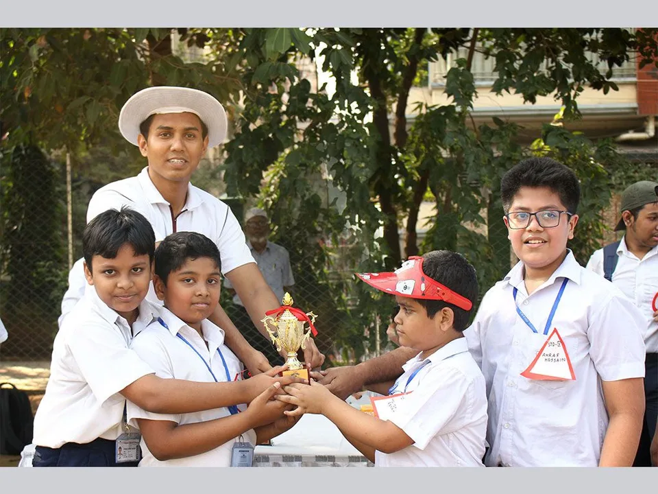 Premier School Dhaka students receiving a sports award